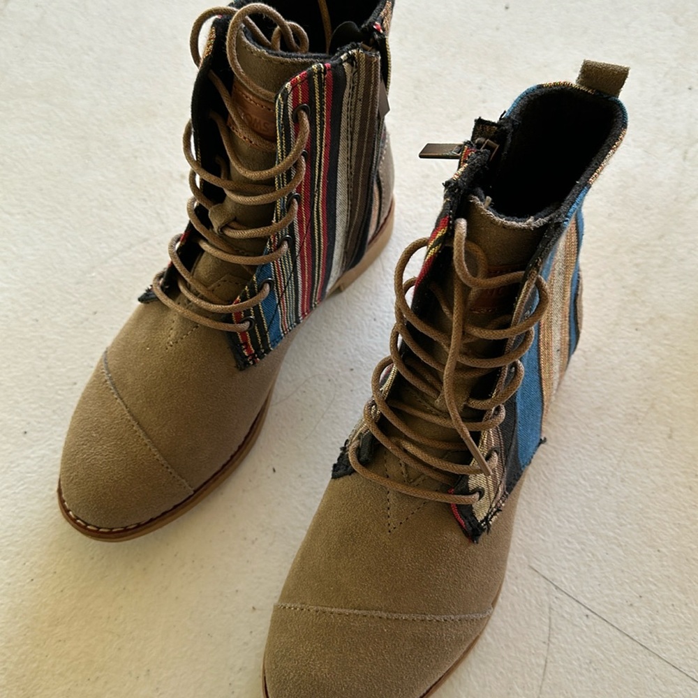 Toms new never worn